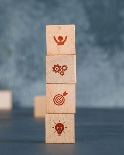 conceptual-business-with-wooden-blocks-column-with-icons